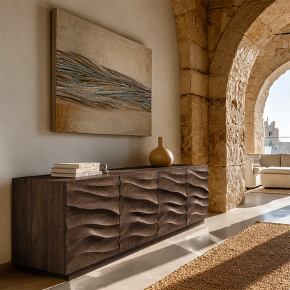 Decorative buffet cabinet with flowing carved surfaces for Mediterranean inspired interiors