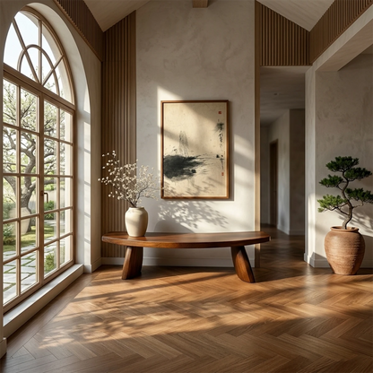 Modern hallway bench showcasing gently curved slab form and refined walnut tone finish detail