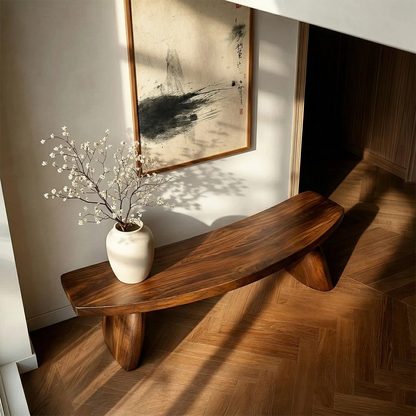 Japandi style entry bench showcasing organic curved structure and refined walnut tone finish