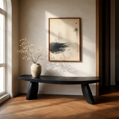 Low profile hallway bench designed with curved silhouette and smooth black tone finish