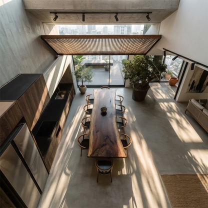 Contemporary solid wood dining table with organic edges, elegant modern interior with natural light