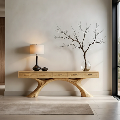 This modern entryway showcases a solid wood console table with symmetrical curved base design