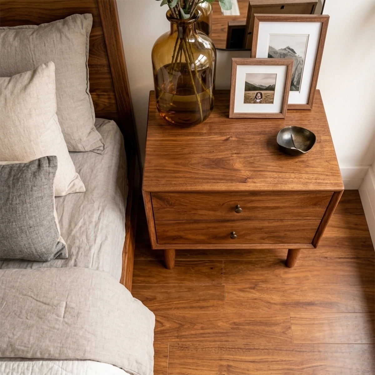 Stylish bedroom side table designed with sleek profile and smooth brown tone finish