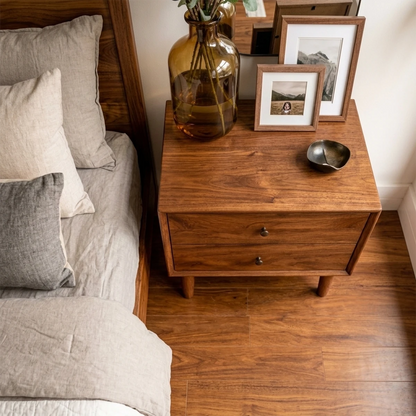 Stylish bedroom side table designed with sleek profile and smooth brown tone finish