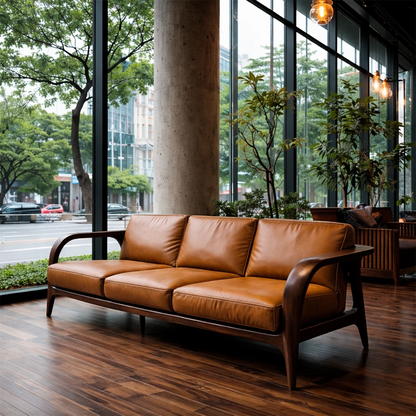 Sleek contemporary sofa with low profile, leather seating and handcrafted wood structure indoors