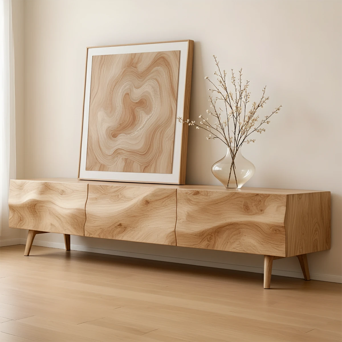 TV stand in oak finish with natural grain visual and minimalist form in a warm interior