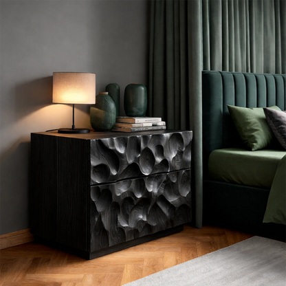 Minimalist bedside cabinet showcasing sculpted modern texture and elegant black tone finish