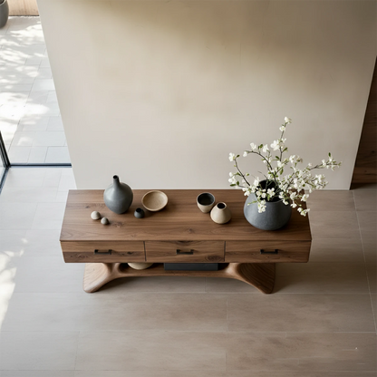 Refined entryway table with natural wood structure and sculptural legs in modern minimalist home