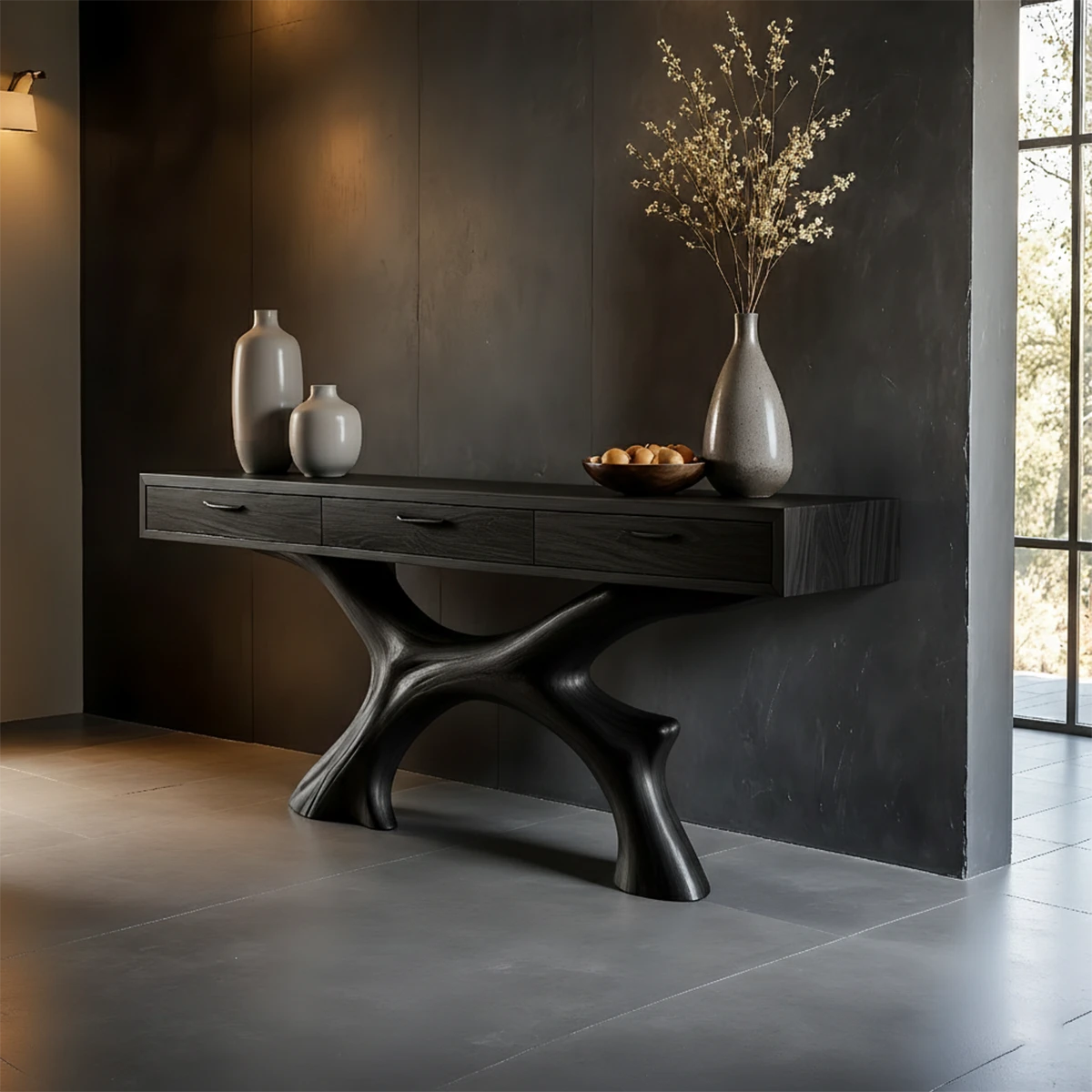 Refined console table with sculptural base and built in drawers for contemporary interiors