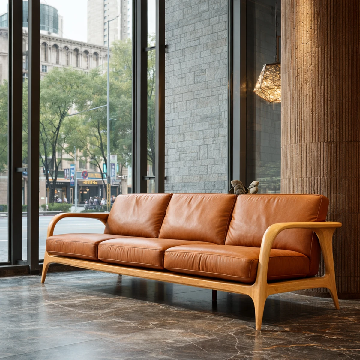 Contemporary wood frame sofa with soft leather seating and curved arm details in modern interior