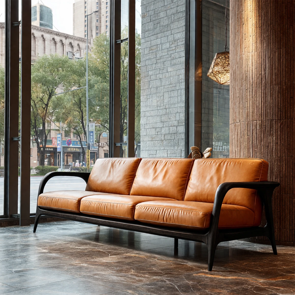 Designer three seat sofa with natural wood accents and leather upholstery in spacious living area