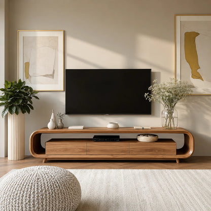Modern living room with wooden TV stand, television, and decorative items.