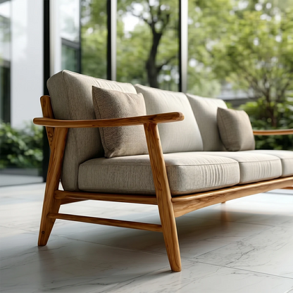 Minimalist living room sofa with neutral fabric seating and solid natural wood base in open interior