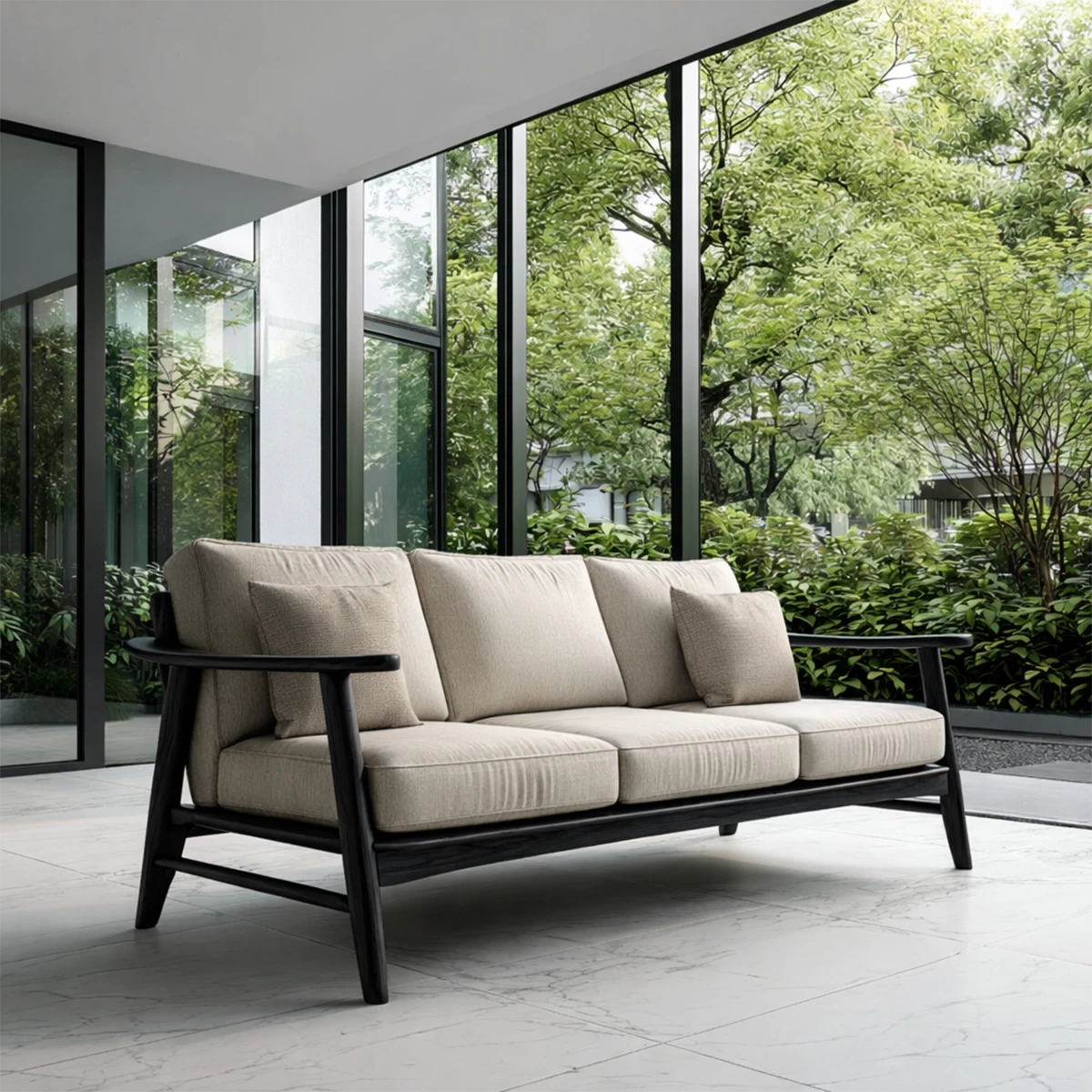 Designer sofa with neutral upholstery and exposed wood frame placed in modern architectural space