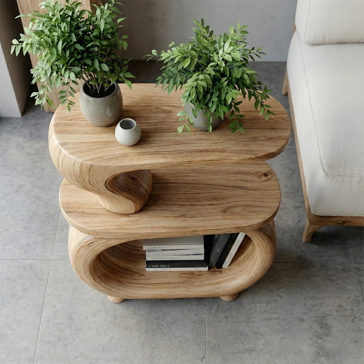 Featuring a light wood color side table with curved base and open shelf for decor display
