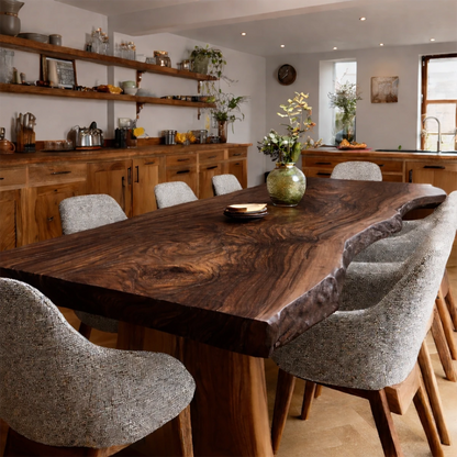 Natural textures define this kitchen, centered around a live edge wood dining table with sculptural base