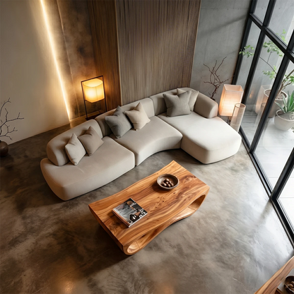Natural wood coffee table with smooth sculpted form for elegant modern home interiors
