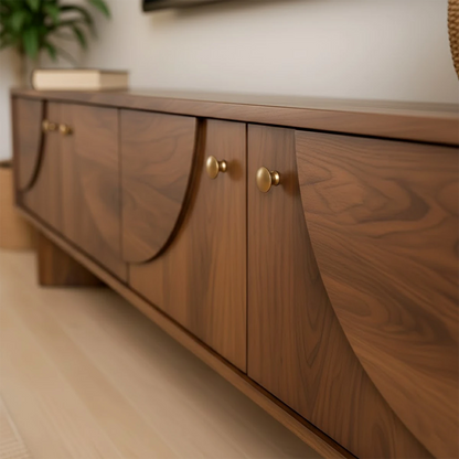 Modern TV stand in soft brown finish with smooth surface and low profile in a bright interior