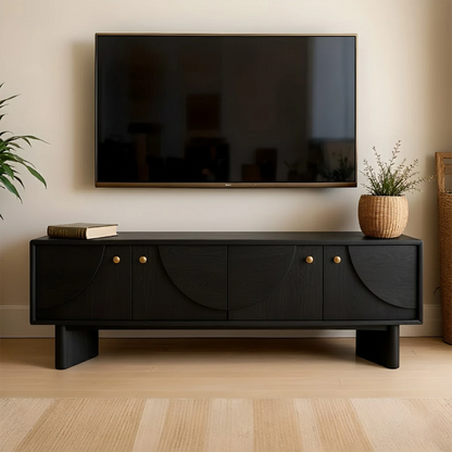 Soft black TV stand with minimal form and smooth finish in a contemporary living room