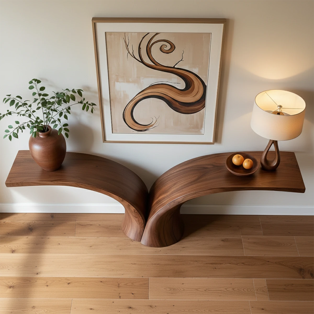 Natural wood console table with artistic shape enhances this clean and modern entryway design