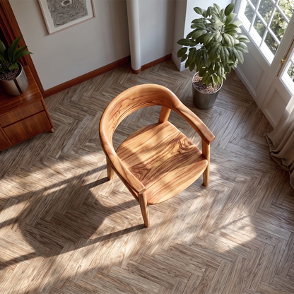 Curved back wooden chair with armrests offers comfort and style in a clean modern room