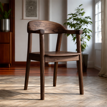 Solid wood armchair with organic shape and smooth finish enhances a minimalist interior