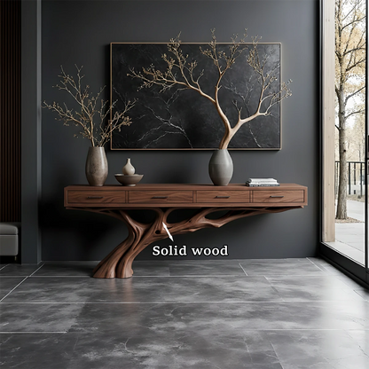 Refined modern space featuring a wood console table with artistic tree-inspired base design