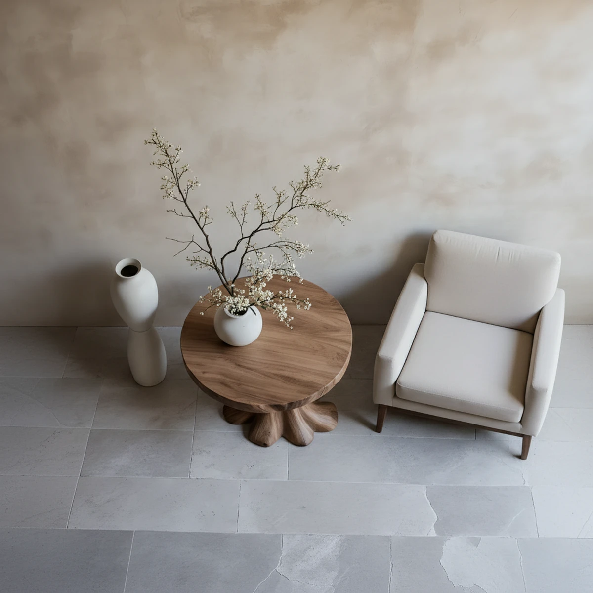 Contemporary accent table in walnut color finish with sculptural base and smooth rounded edges