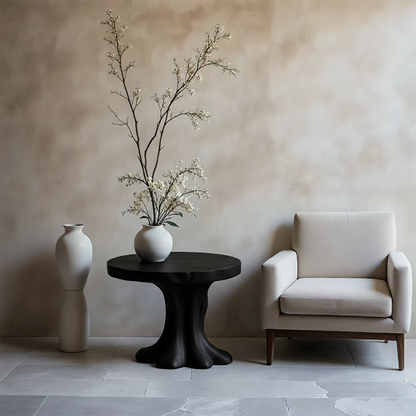 Minimal black tone accent table with curved base and clean design for modern interiors