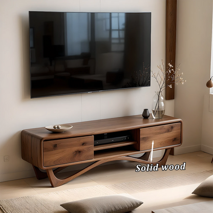 A contemporary TV stand in walnut color with curved support and sleek storage design