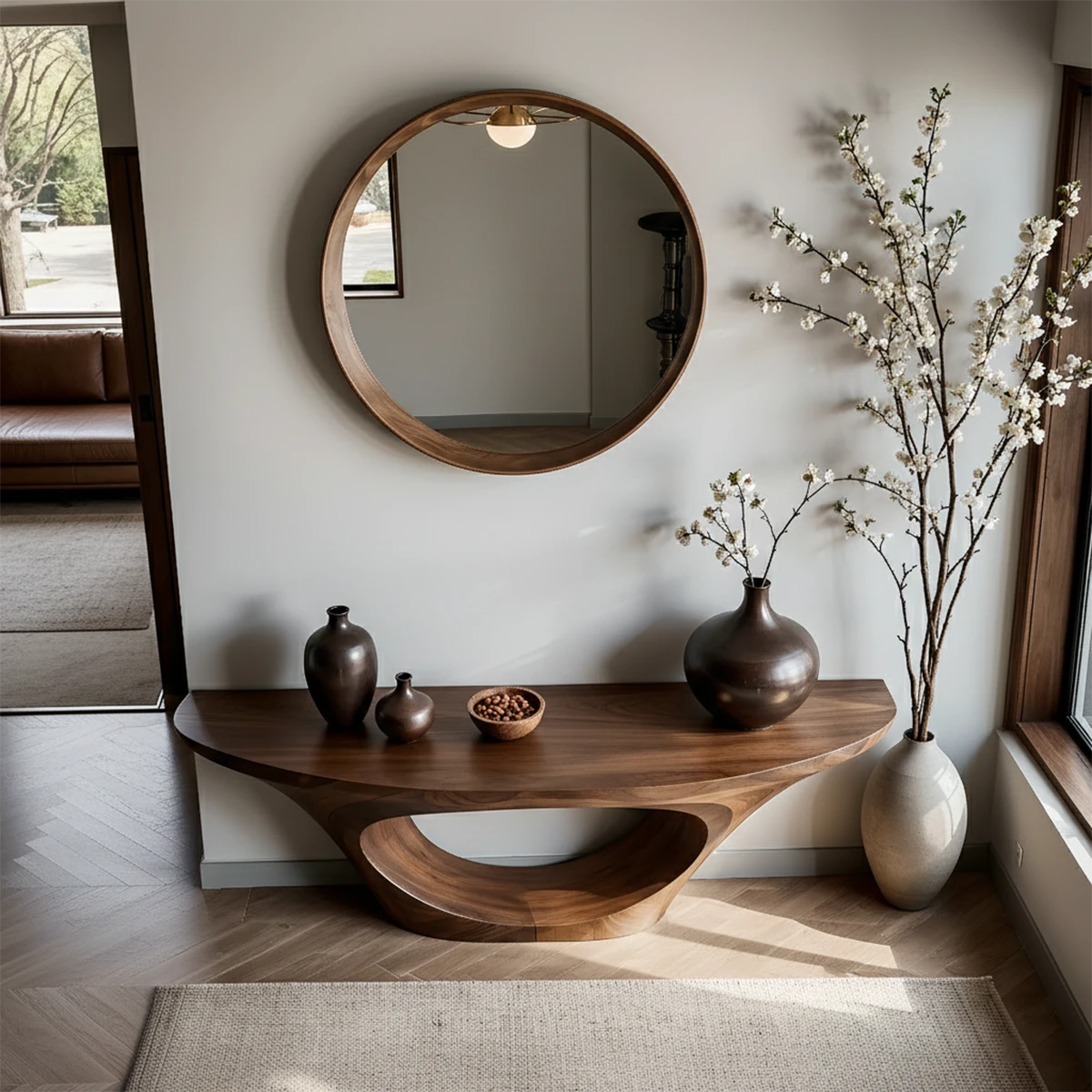 Minimal walnut console table with oval wood base