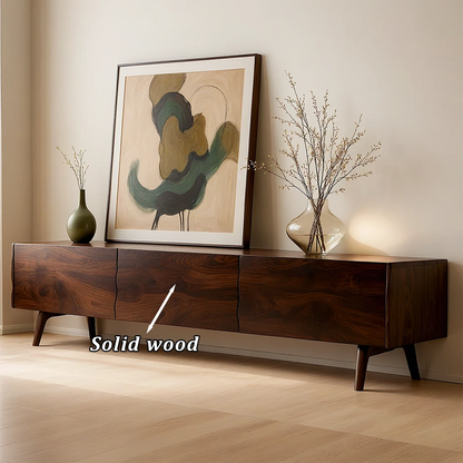 TV stand in walnut finish with clean lines and organic grain detail in a modern home interior