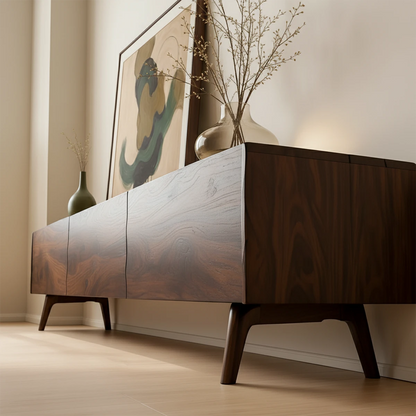 Walnut finish TV stand with smooth surface and natural grain detail in a minimalist living space