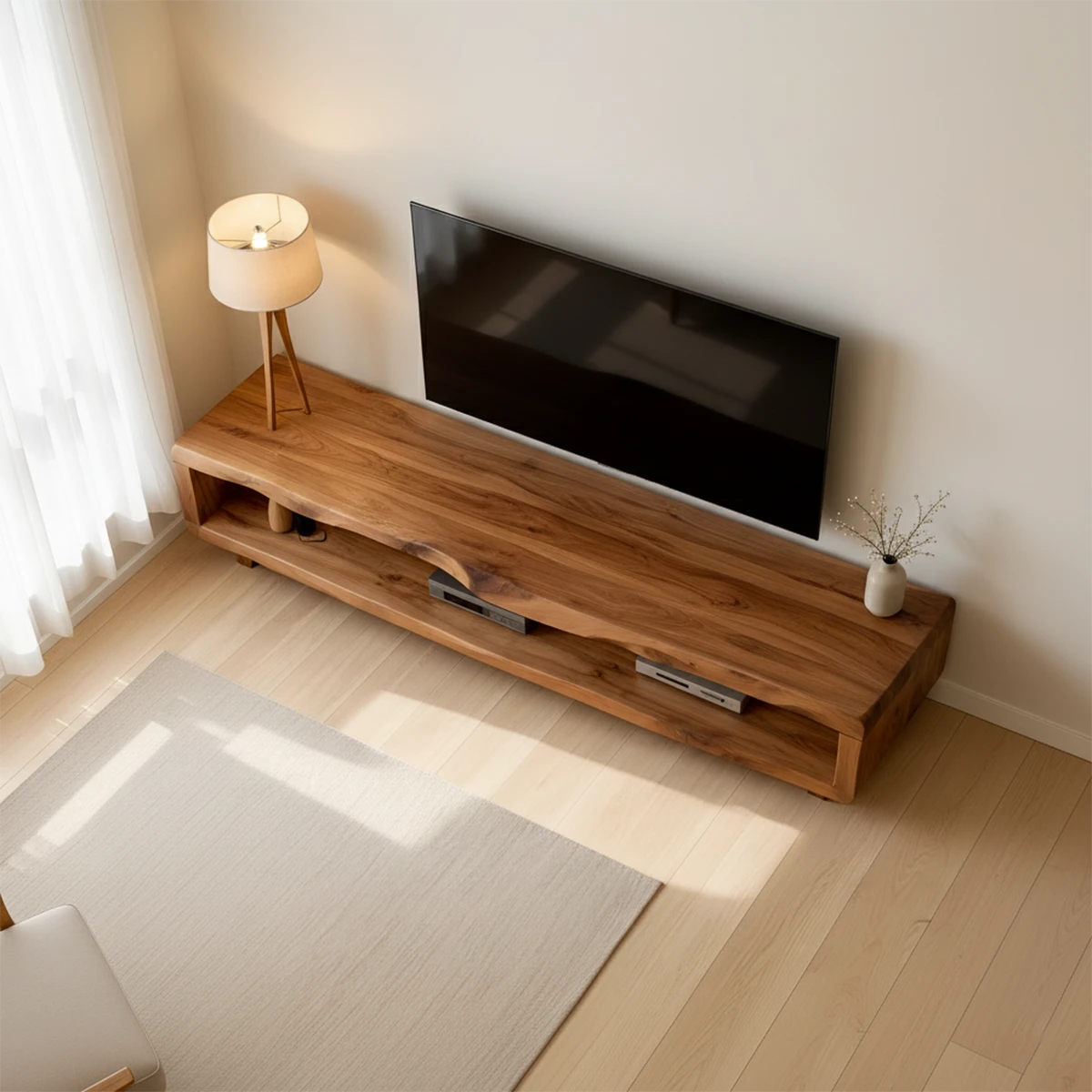 TV stand in warm brown finish with clean silhouette and natural grain detail in a neutral room
