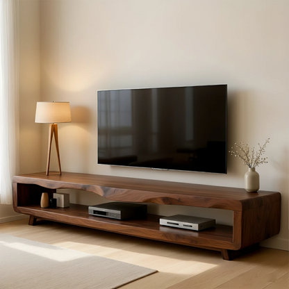 Warm walnut TV stand with minimal form and open shelf layout in a contemporary living room