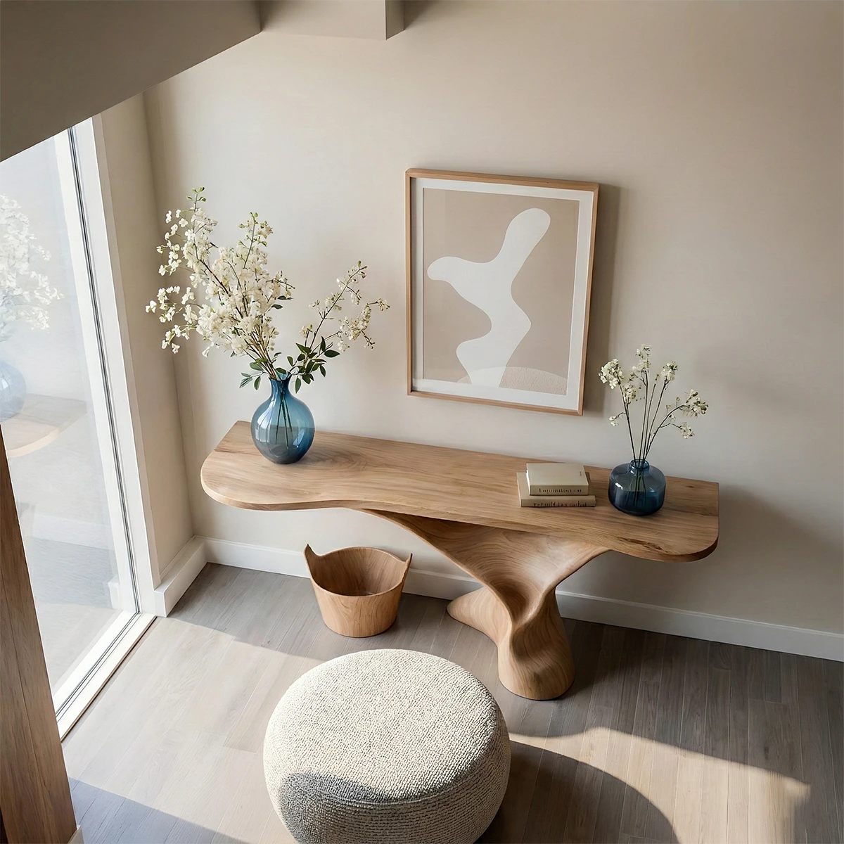 Artistic oak console table with organic pedestal support