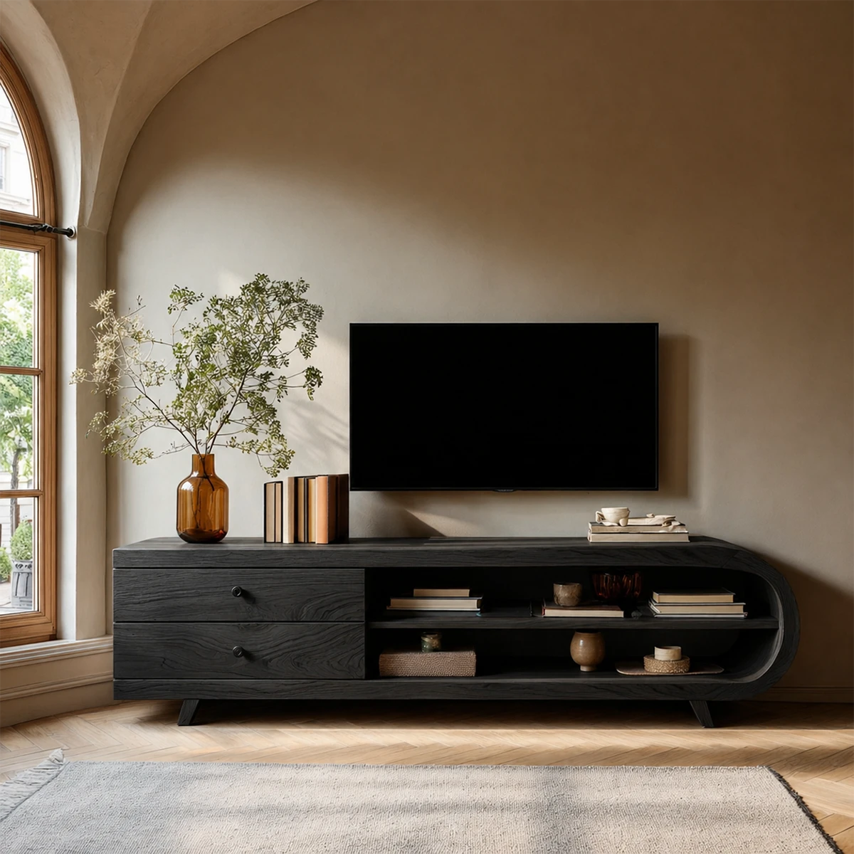 Contemporary storage console under wall TV with curved frame and organized compartments