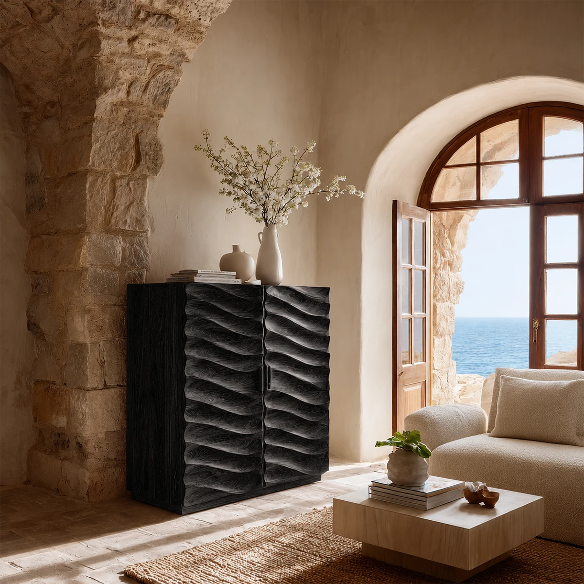 Elegant sideboard storage cabinet with curved carved detailing and natural wood character