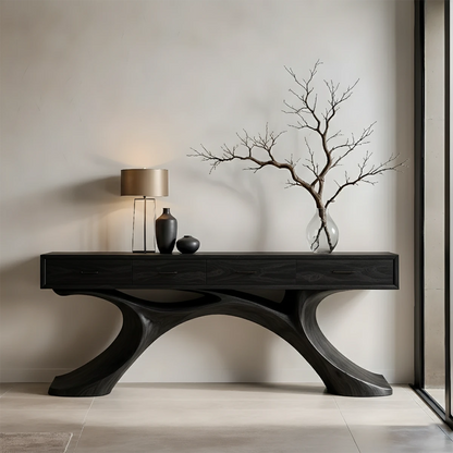 Refined entryway console featuring sculptural base and clean drawer storage layout