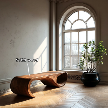 Organic modern bench showcasing flowing loop structure and refined walnut tone finish surface
