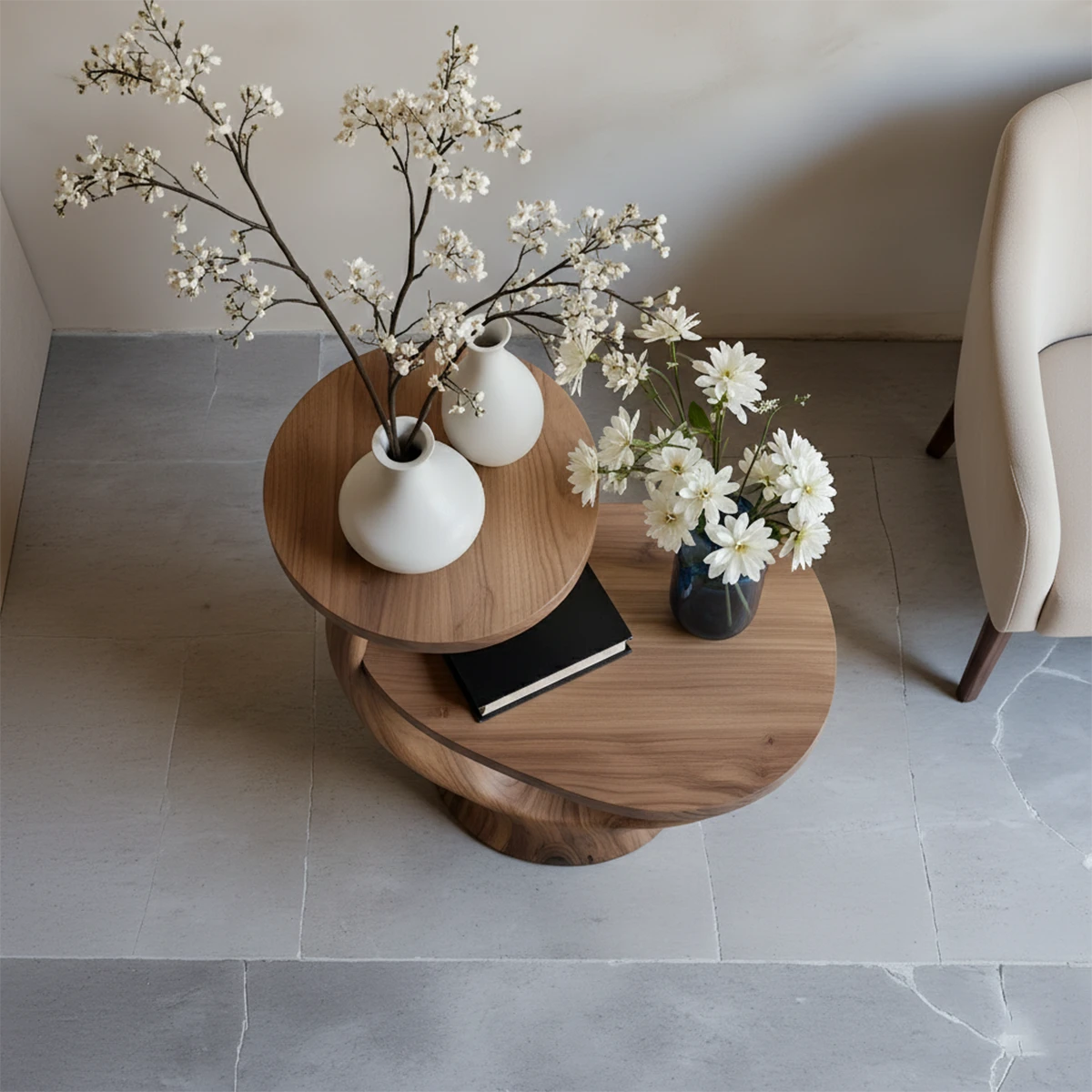 Featuring a walnut tone end table with curved silhouette and functional display space