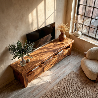 Earthy living room setup with wooden TV unit and practical drawer storage design