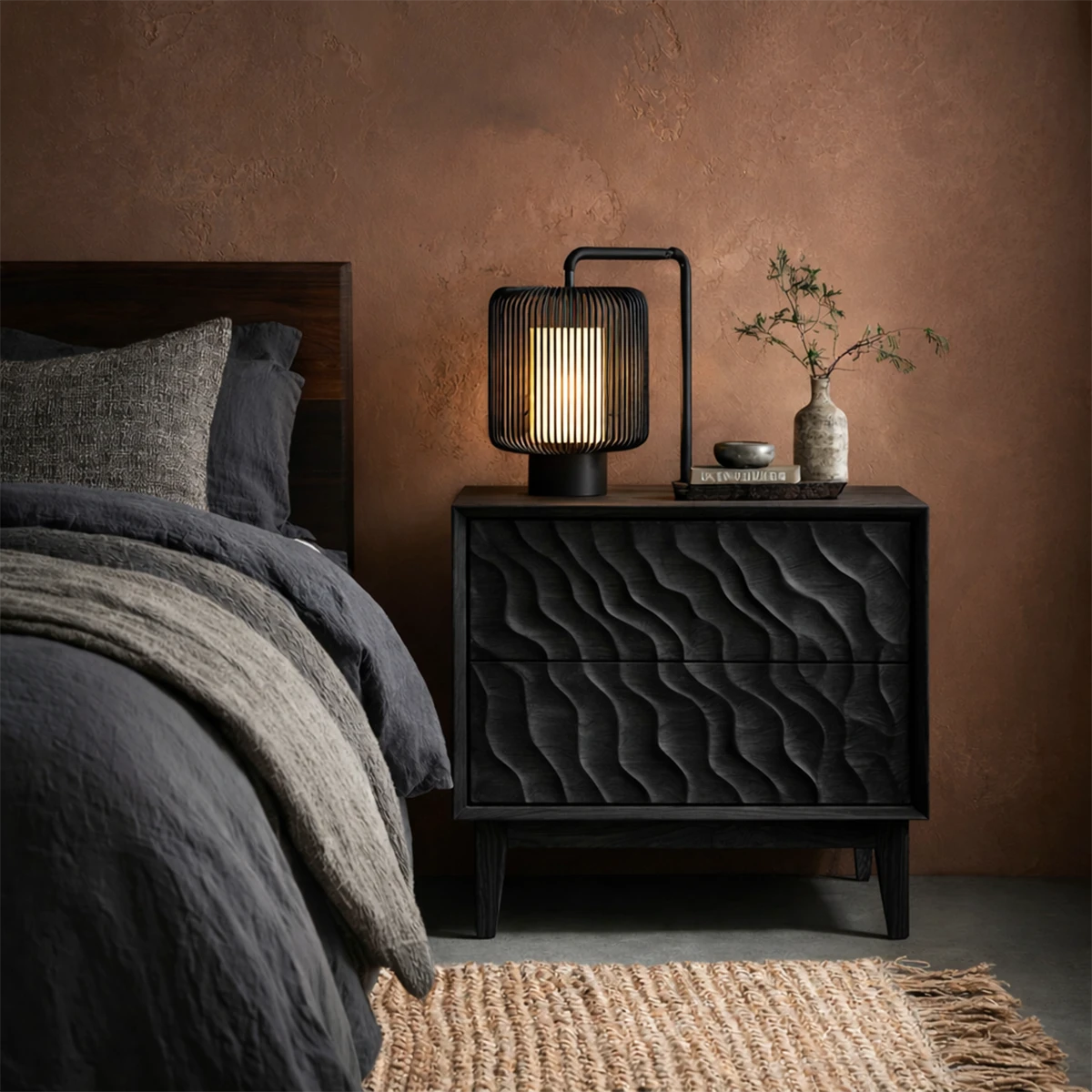 Stylish bedroom side table designed with modern textured fronts and smooth black tone finish